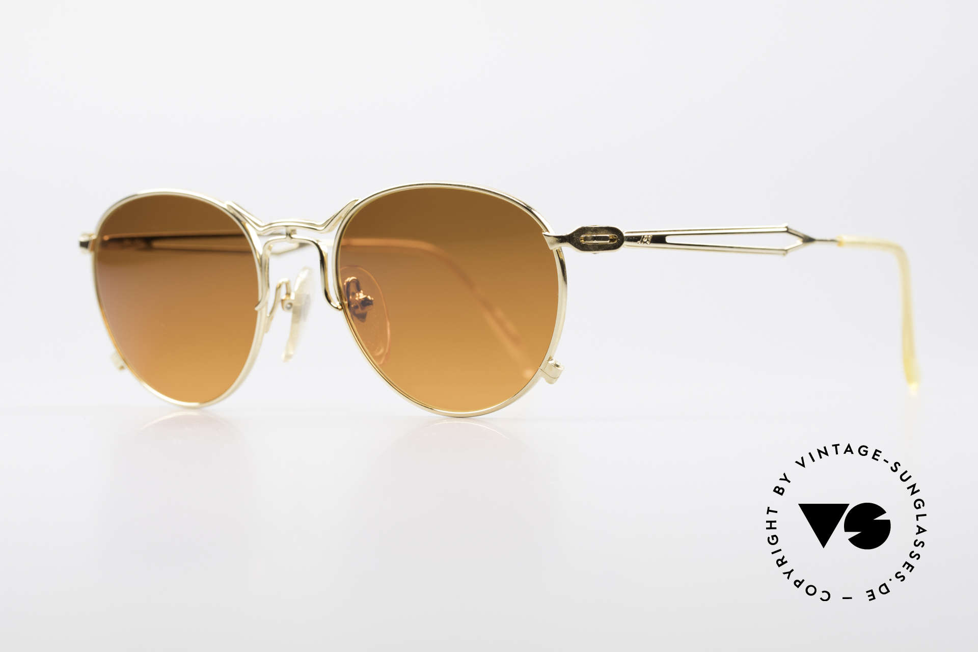 Jean Paul Gaultier 55-2177 Gold Plated Designer Frame, the sun lenses are tinted like a sunset (auburn gradient), Made for Men and Women