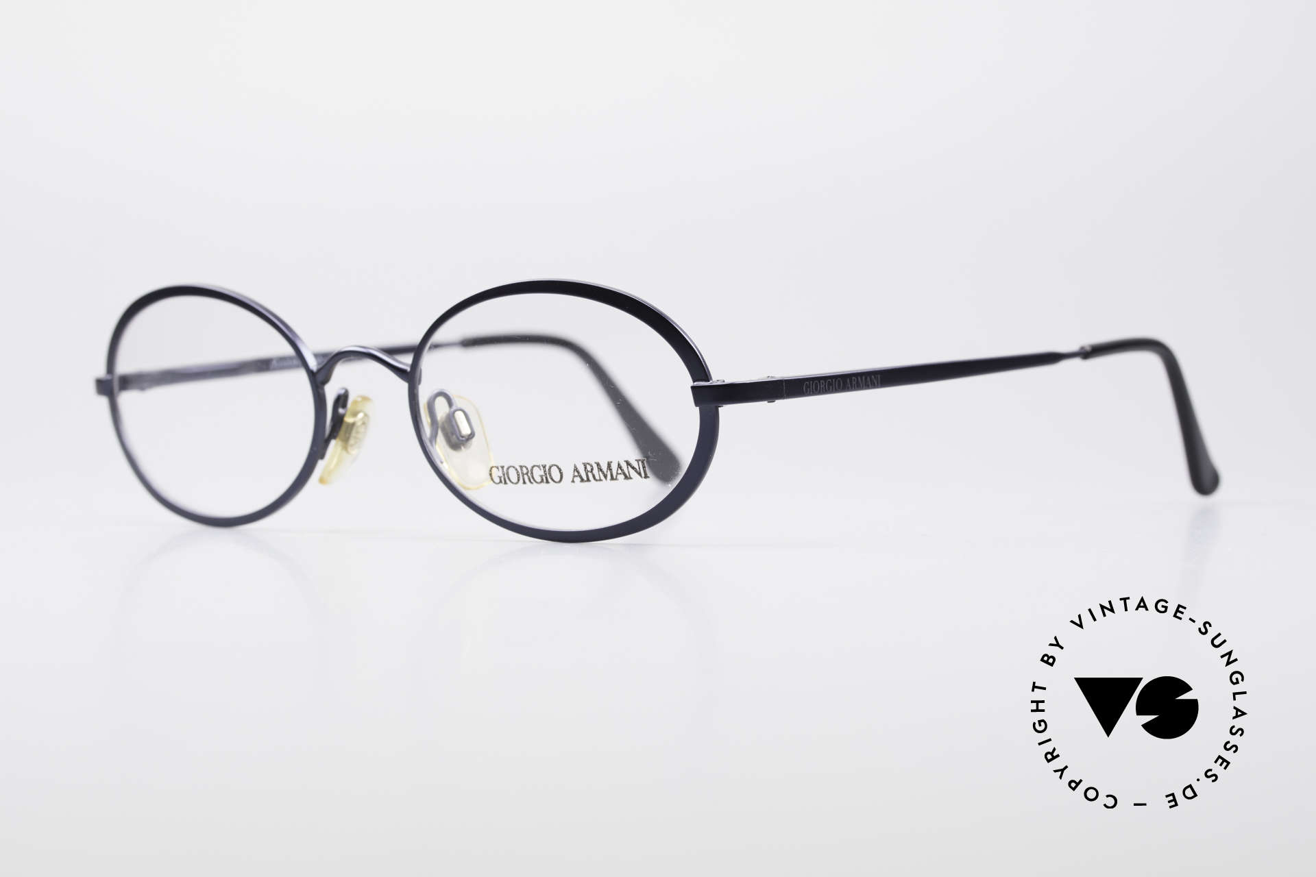 Giorgio Armani 277 90's Oval Vintage Eyeglasses, deep blue frame finish and flexible spring hinges, Made for Men and Women