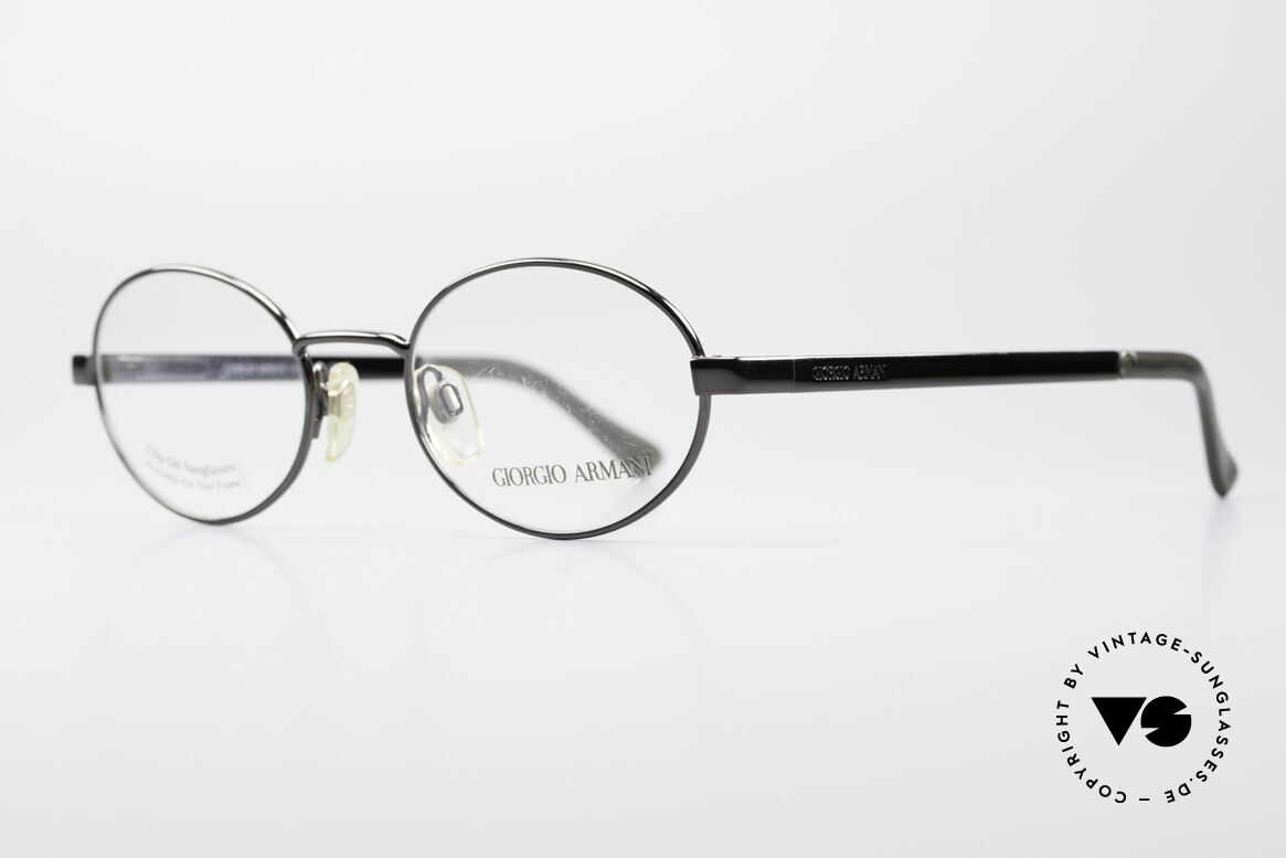Giorgio Armani 257 90s Oval Vintage Eyeglasses, gunmetal frame finish and flexible spring hinges, Made for Men and Women