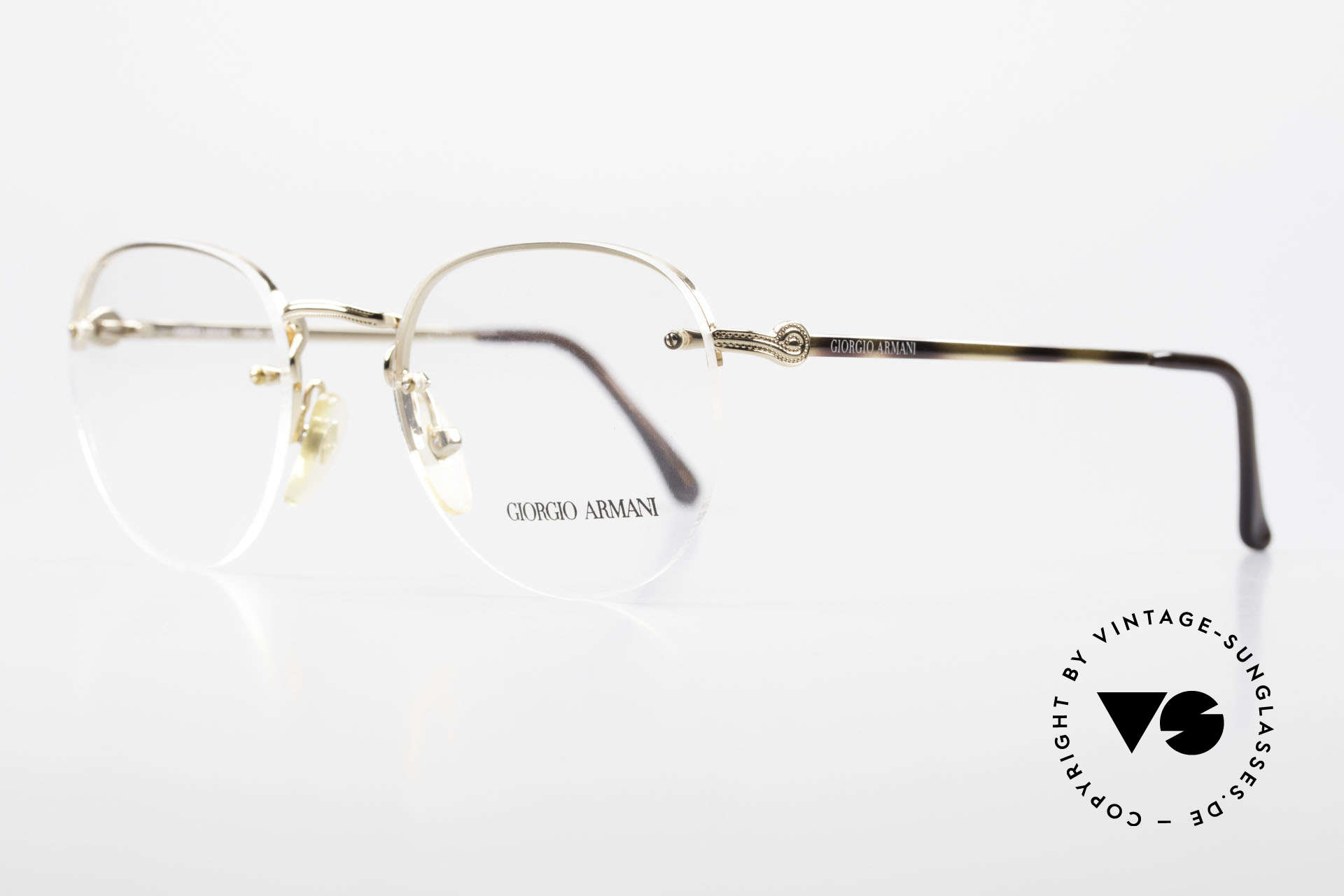Giorgio Armani 161 Rimless Vintage Eyeglasses 80s, demo lenses are fixed with screws on the metal frame, Made for Men and Women