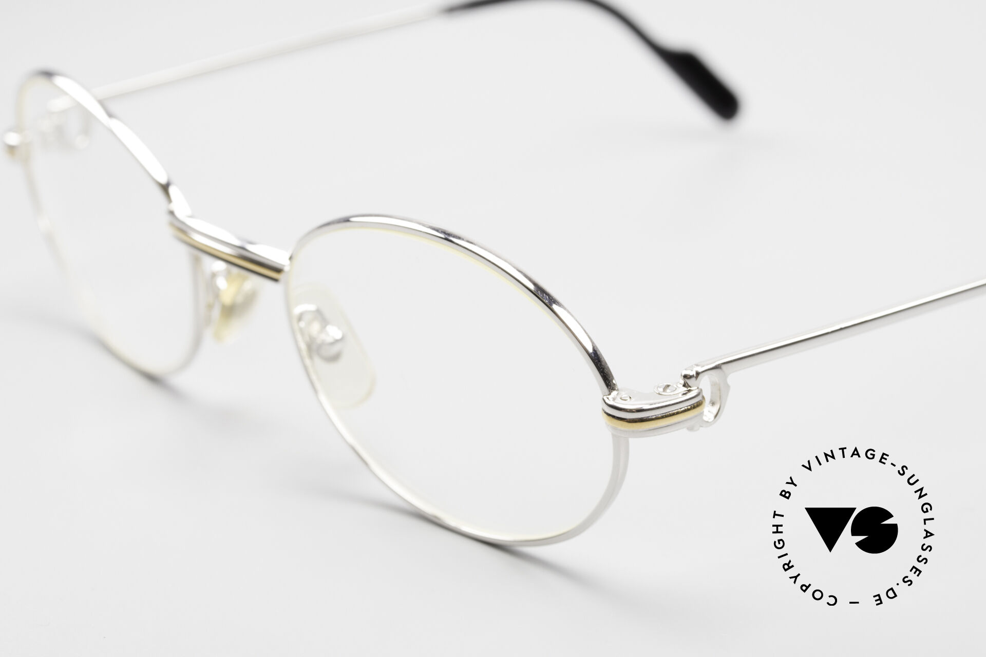 Cartier gold oval glasses discount