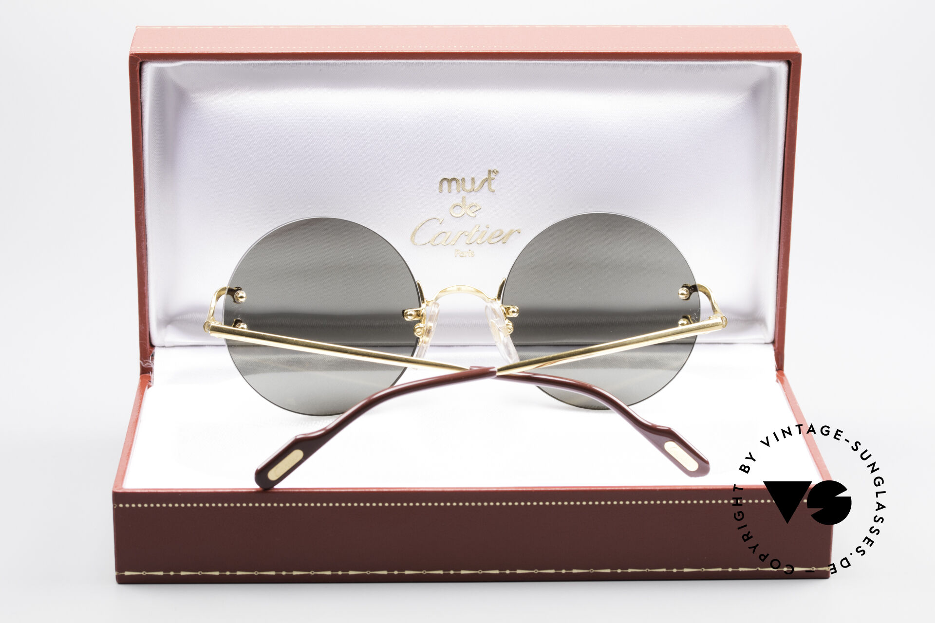Cartier madison sales round rimless sunglasses