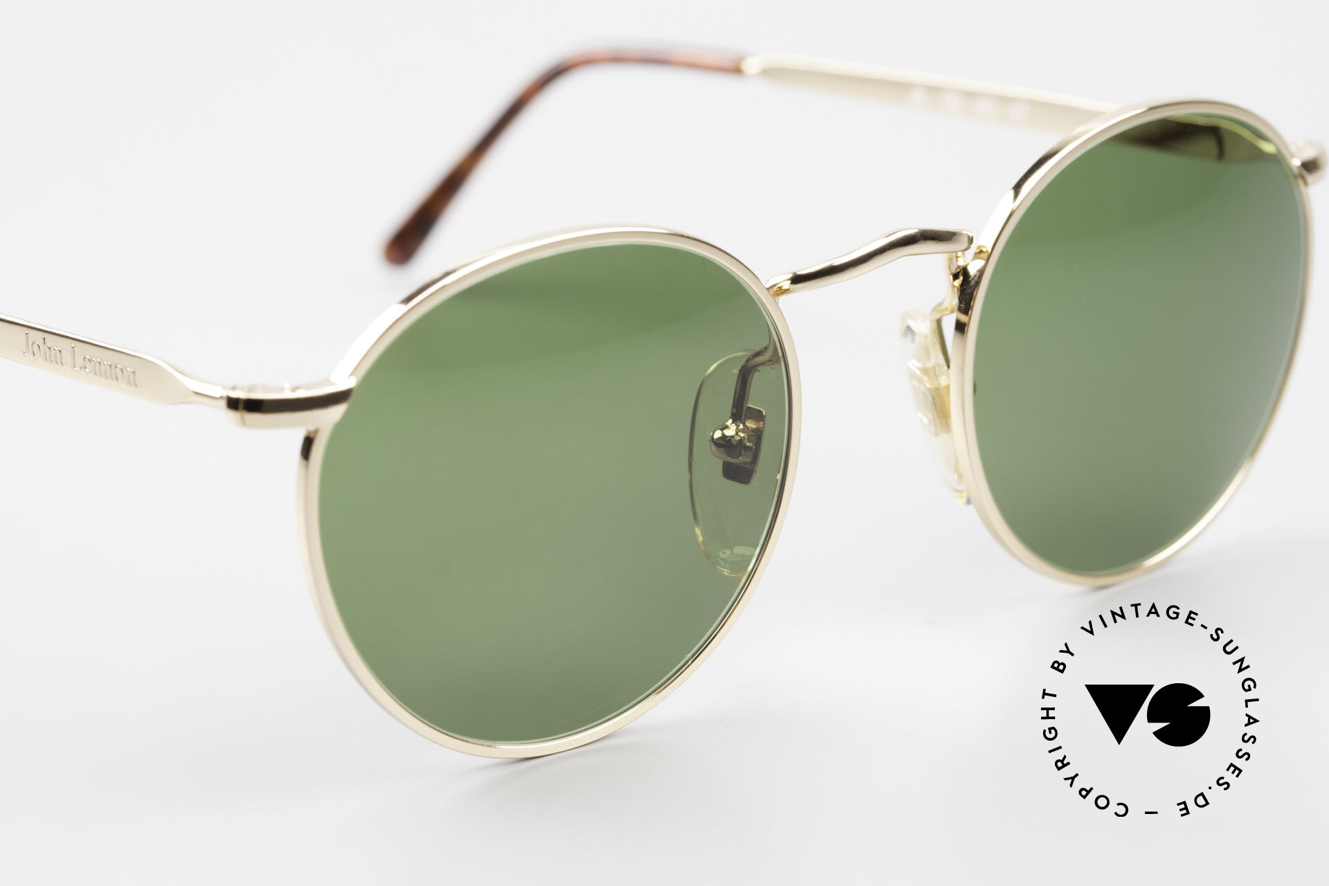 John lennon 2025 green sunglasses