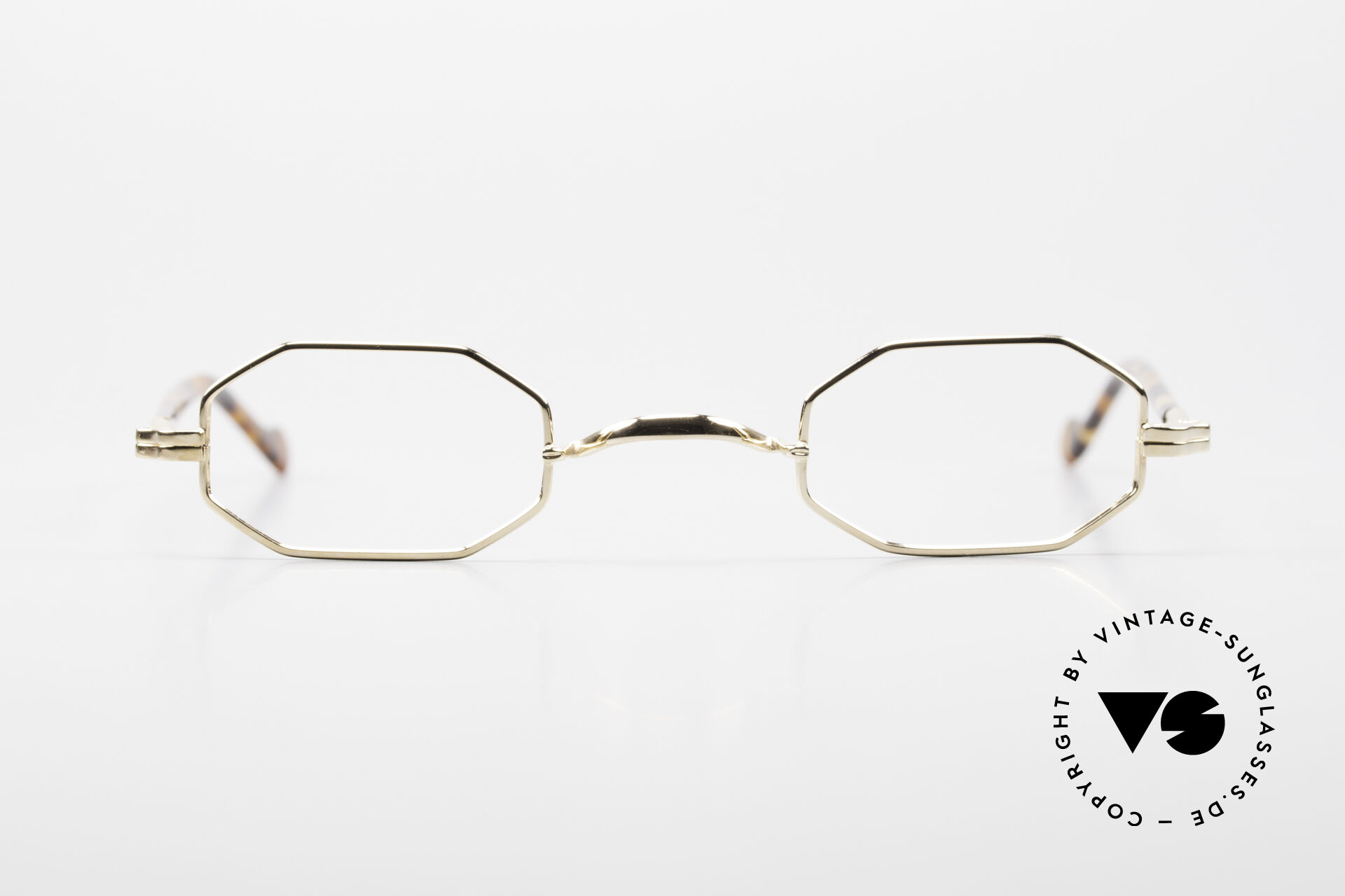 Gold octagon glasses top