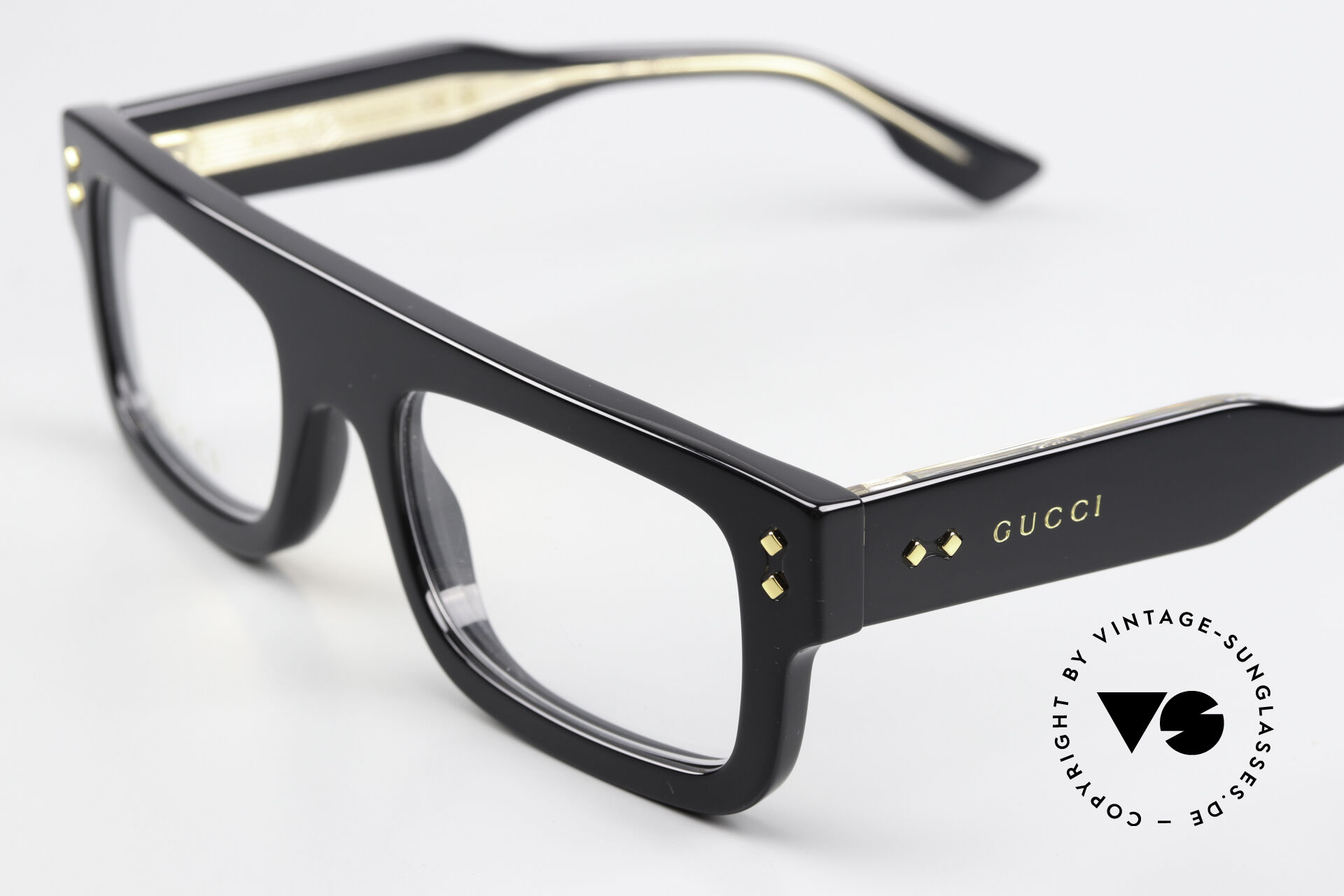 Gucci ゴールド/ブラック ダブルブリッジ アイウエア Rectangular frame sunglasses in gold-toned metal | GUCCI® US