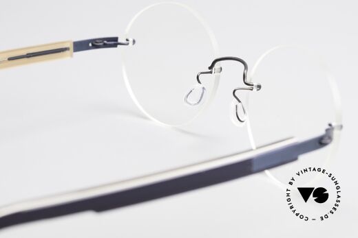 Lindberg 2111 Strip Titan Rimless Titanium Frame Round, minimalist design: free from screws, rivets and welds, Made for Men and Women