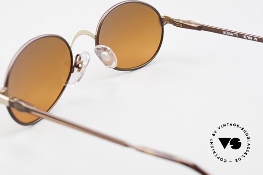 Bugatti 15769 Bronze Brown Metallic Frame, the fancy SUNSET sun lenses can be replaced optionally, Made for Men and Women