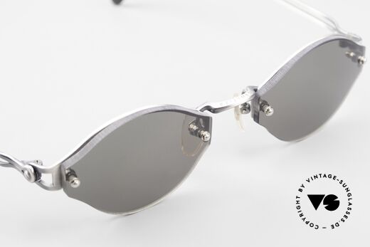 Jean Paul Gaultier 56-7111 Rimless Designer Sunglasses, solid gray plastic sun lenses (for 100% UV protection), Made for Men and Women