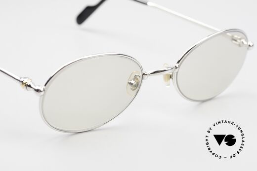 Cartier Saturne Small Oval Frame Changeable, new changeable lenses (darken automatically in the sun), Made for Men and Women