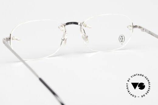 Cartier T-Eye Rimless Titanium Frame Rimless, lens size (gliding lens) can be changed if needed, Made for Men and Women