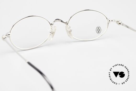 Cartier Filao Small Oval Platinum Frame, the metal frame can be glazed with lenses of any kind, Made for Men and Women