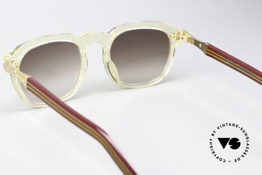 Jean Paul Gaultier 57-1071 Extravagant Designer Frame, brown gradient sun lenses with 100% UV protection, Made for Men and Women