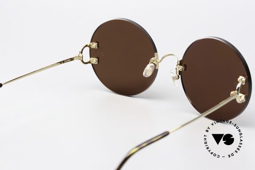 Cartier C-Decor Rimless Feminine Oversize Round, elegant sun lenses by ZEISS for 100% UV protection, Made for Women