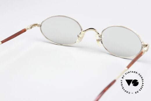 Matsuda 10116 Lenses Darken In The Sun, model also very similar to the J. Paul Gaultier 57-7201, Made for Men and Women