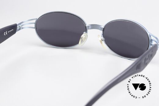Jean Paul Gaultier 58-7203 Turquoise Metallic Finish, sun lenses (100% UV) can be replaced with opticals, Made for Men and Women