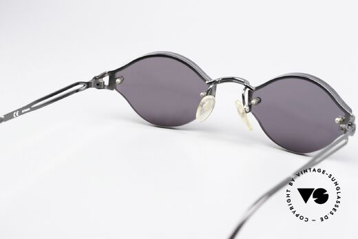 Jean Paul Gaultier 56-7111 Rimless Designer Sunglasses, solid gray plastic sun lenses (for 100% UV protection), Made for Men and Women