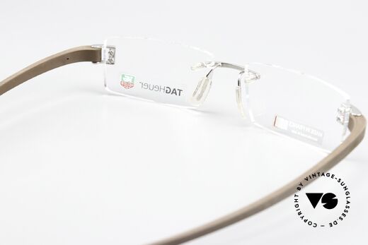 Tag Heuer 7103 Fold Temples Like A Formula 1 Tire, unworn, ruthenium-plated and with full packaging, Made for Men Tag Heuer 7103 Fold Temples Like A Formula 1 Tire, unworn, ruthenium-plated and with full packaging, Made for Men