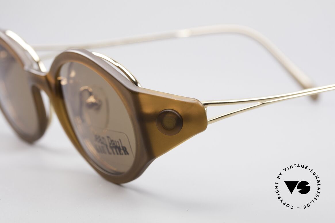 Jean Paul Gaultier 56-7202 Oval Frame With Sun Clip, classic oval metal frame with prominent plastic clip, Made for Men and Women