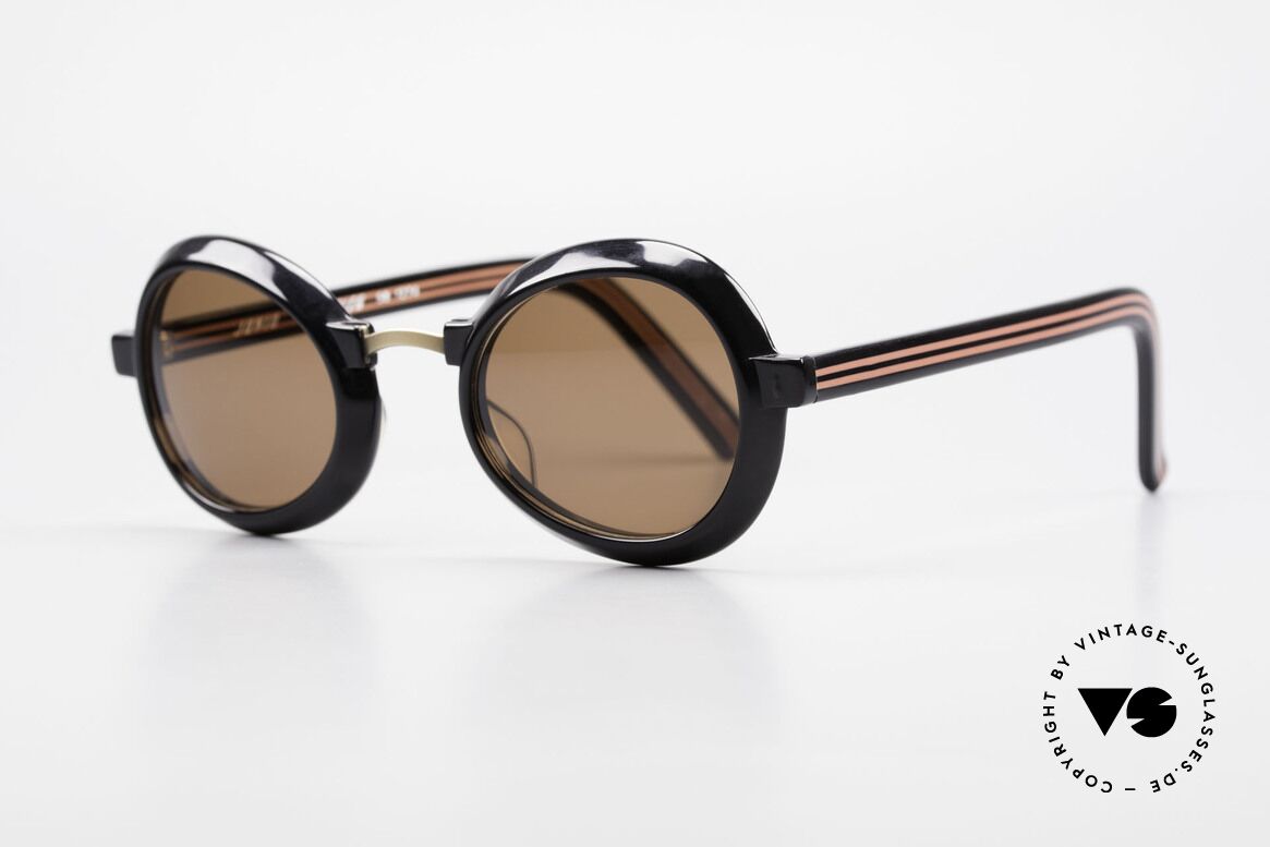 Jean Paul Gaultier 58-1274 Ladies And Gents Sunglasses, great model of the fancy JUNIOR GAULTIER series, Made for Men and Women