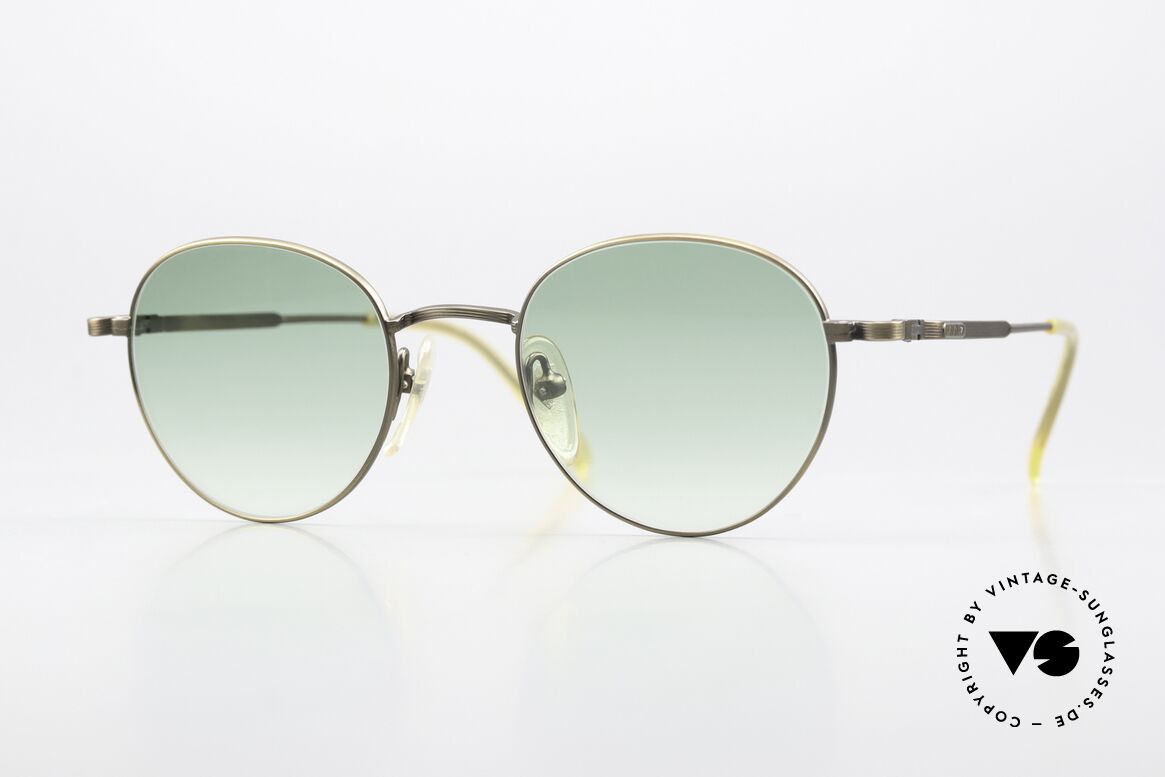 Jean Paul Gaultier 55-1174 Round Designer Sunglasses, costly, unique frame finish: METALLIC SMOKE GOLD, Made for Men and Women