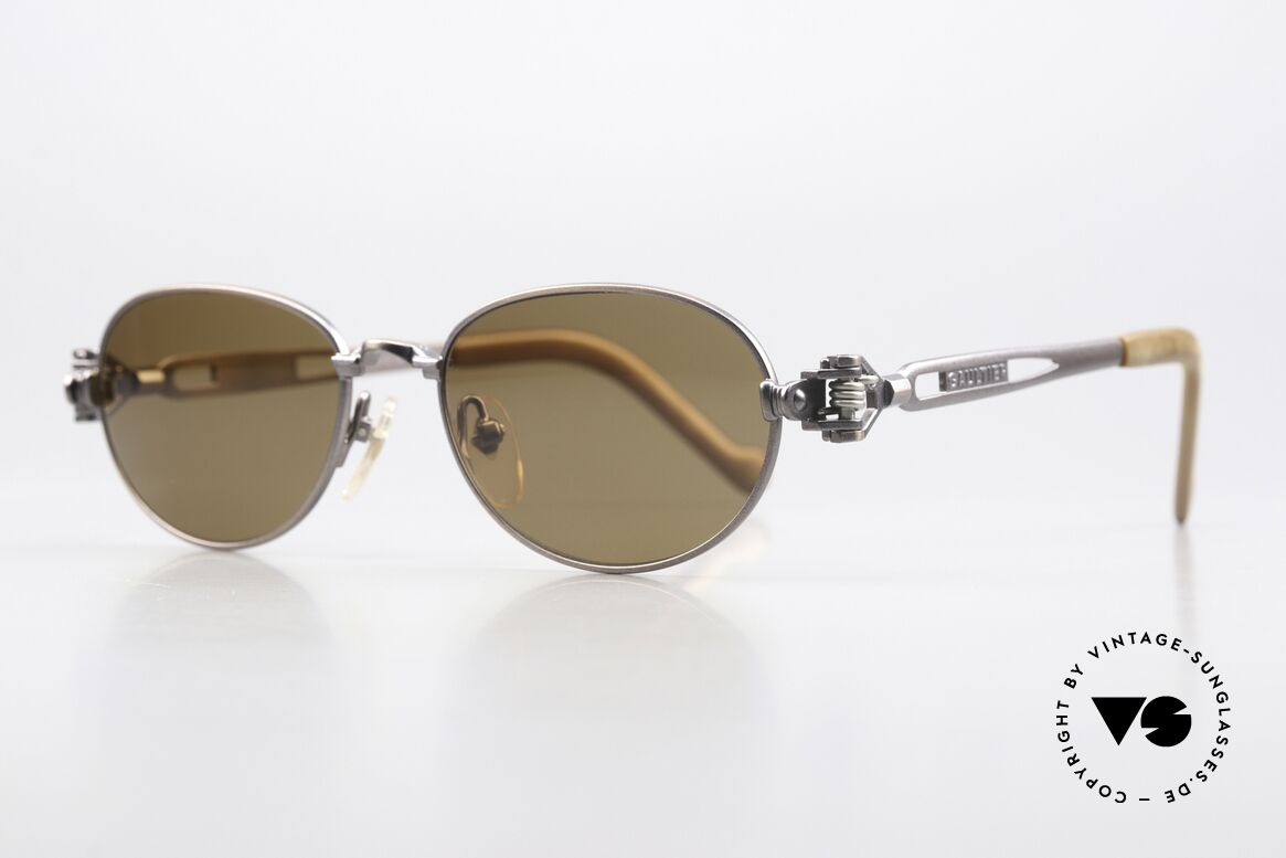 Jean Paul Gaultier 56-8102 Oval Steampunk Sunglasses, frame with some mechanical components / details, Made for Men and Women