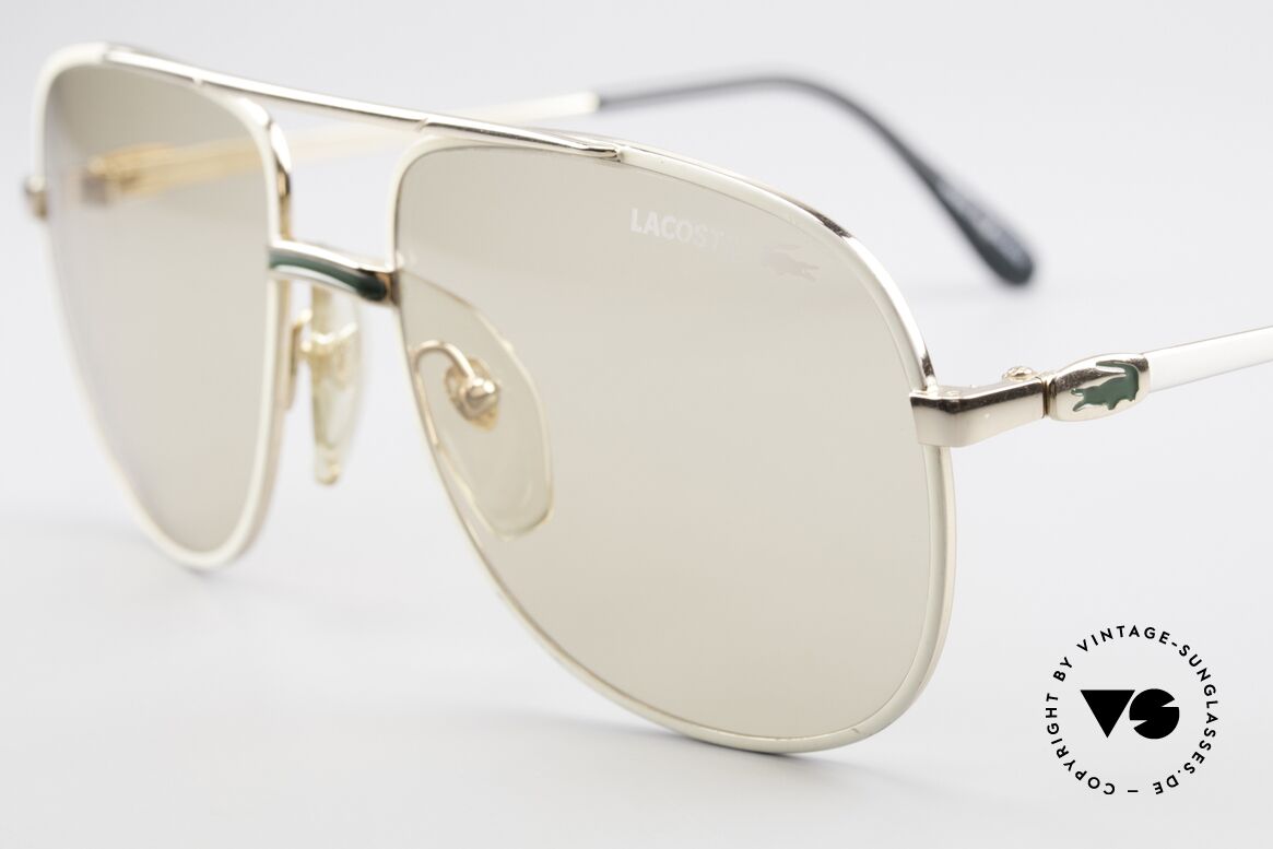 Lacoste 101 Lacoste Changeable Lenses, the lenses are lighter in the shade and darker in the sun, Made for Men