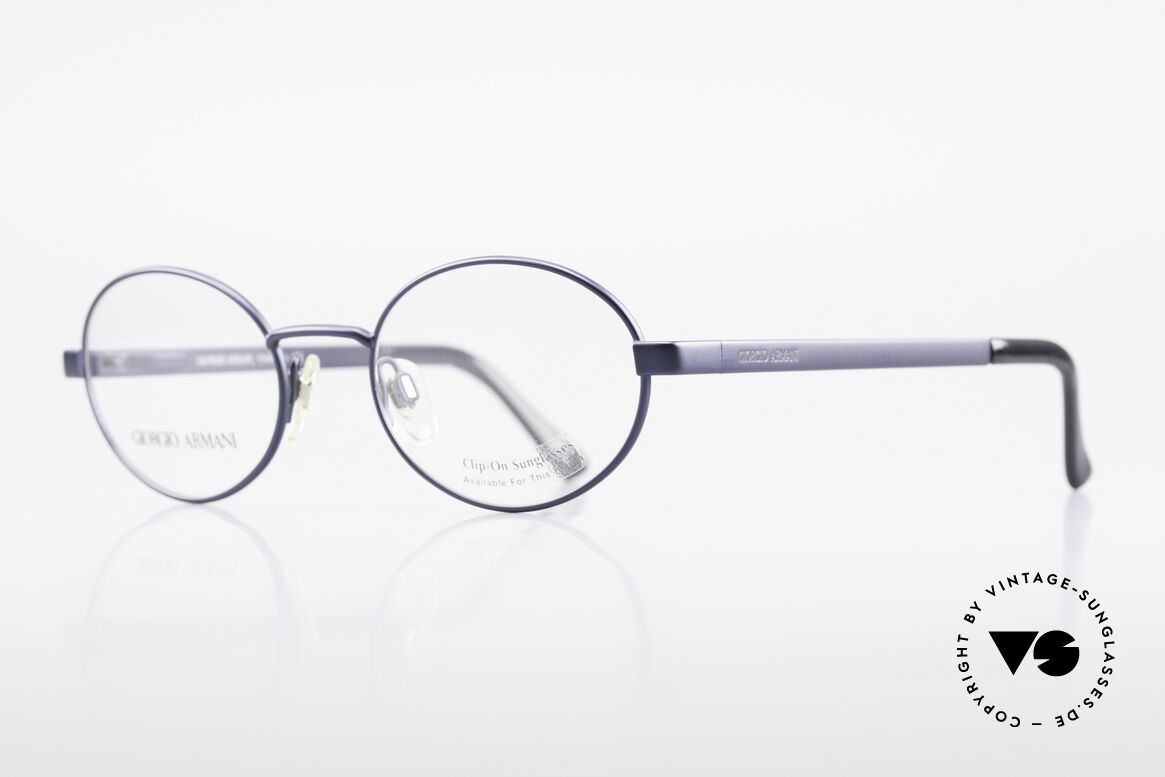 Giorgio Armani 257 90's Oval Vintage Eyeglasses, deep-blue frame finish and flexible spring hinges, Made for Men and Women