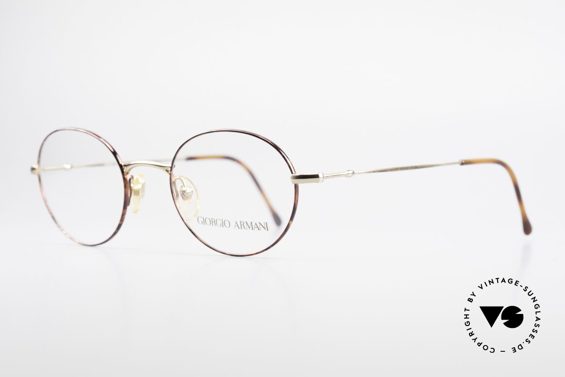 Giorgio Armani 252 Oval Vintage Eyeglasses 90's, elegant frame finish in gold and chestnut-brown, Made for Men and Women