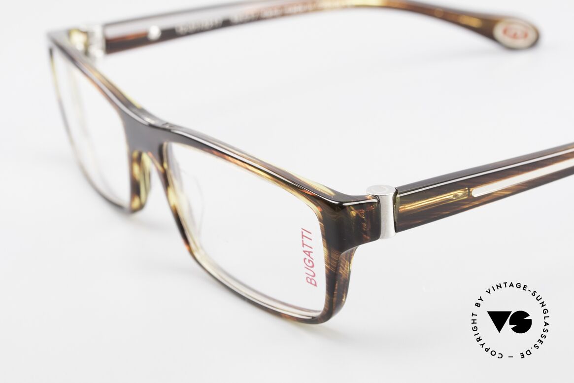 Bugatti 487 Striking Designer Eyeglasses, unworn model comes with orig. case & packing, Made for Men