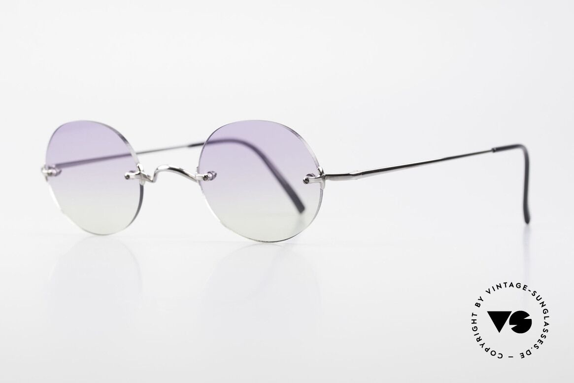 Freudenhaus Flemming Round Rimless Sunglasses, silver/chrome metal components are made in Japan, Made for Men and Women