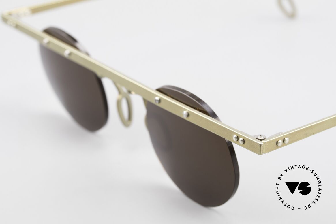 Theo Belgium Tita VII 10 Crazy Titanium Sunglasses 90s, the round sun lenses are fixed with screws at the frame, Made for Men and Women