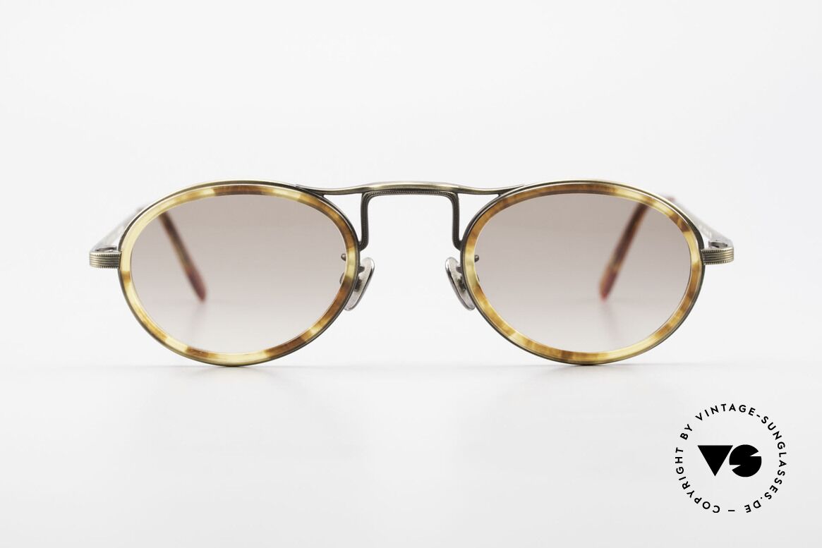 Oliver Peoples MP1 Vintage Designer Frame Oval, vintage Oliver Peoples sunglasses from the late 1990's, Made for Men and Women
