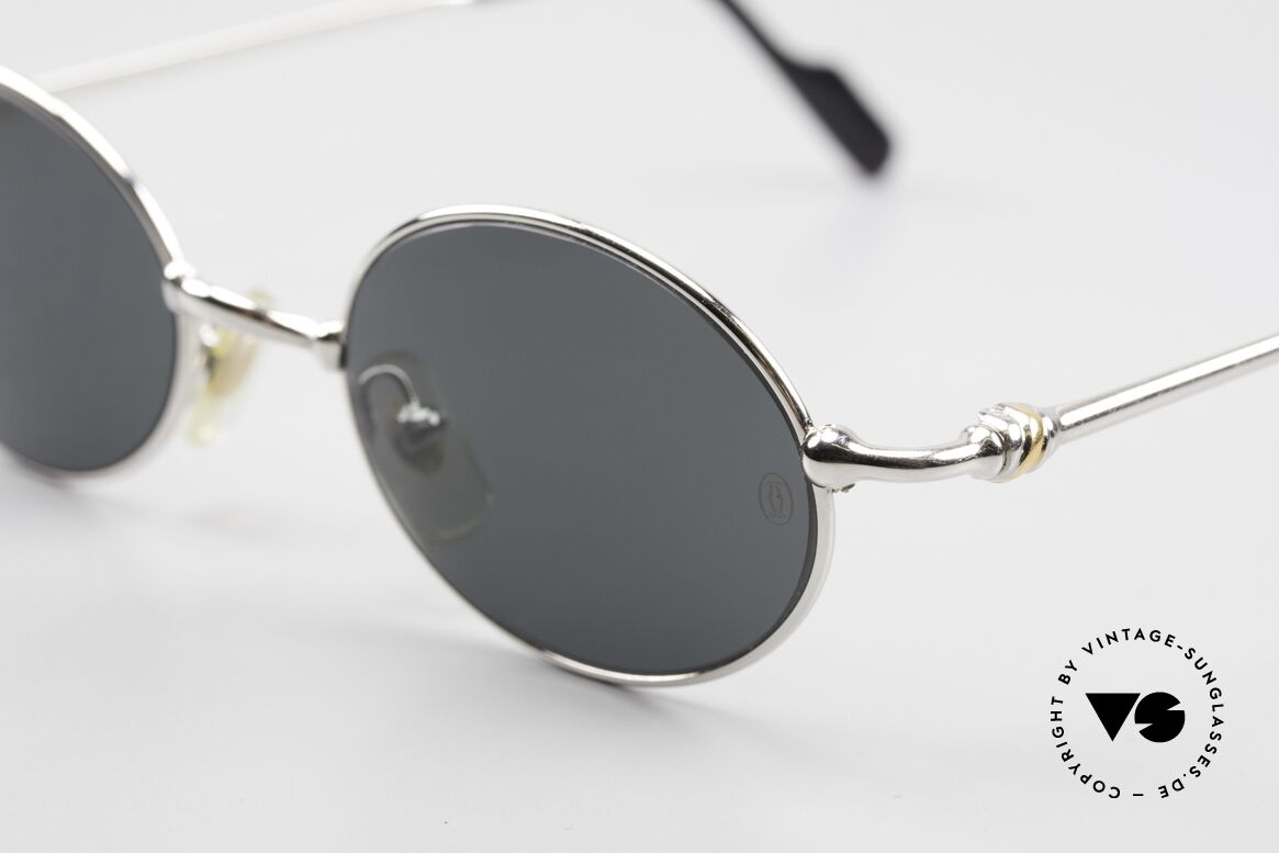 Cartier Filao Oval Platinum Sunglasses 90's, with original Cartier sun lenses (with CARTIER logo), Made for Men and Women