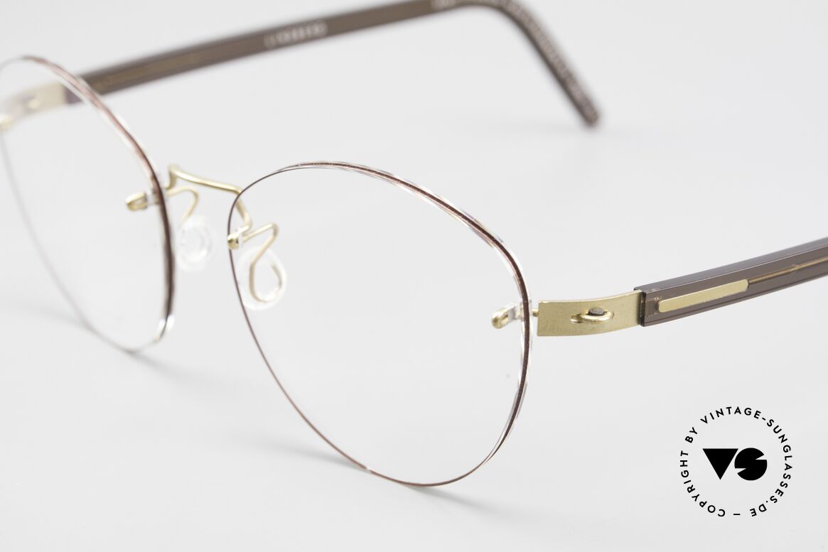 Lindberg 2303 Strip Titan Rimless Titanium Ladies Frame, resilient & flexible frame (lens shape can be modified), Made for Women