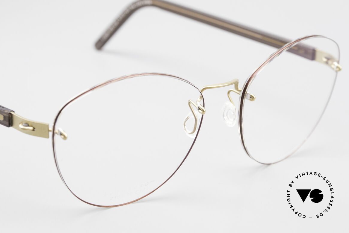 Lindberg 2303 Strip Titan Rimless Titanium Ladies Frame, unworn, New Old Stock, with original case by Lindberg, Made for Women