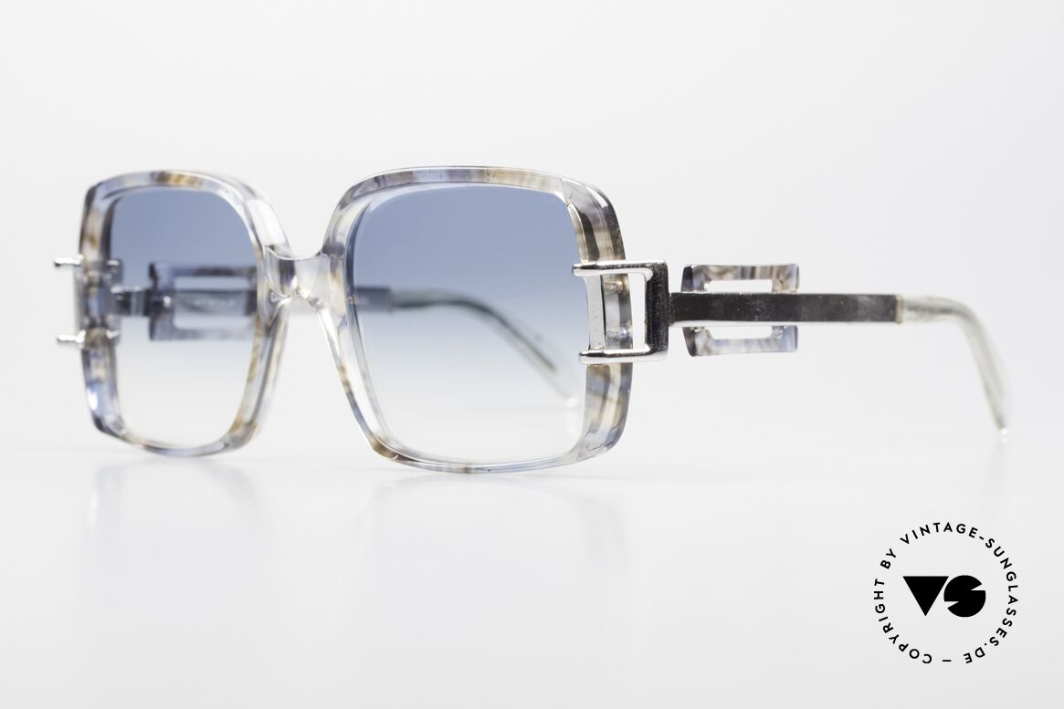 Neostyle Stereo 5 1970's Sunglasses Old School, bluish-translucid patterned with silver temples, Made for Women