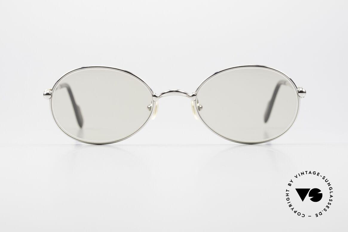 Cartier Saturne Small Oval Frame Changeable, model from the 'Thin Rim' series by Cartier (lightweight), Made for Men and Women