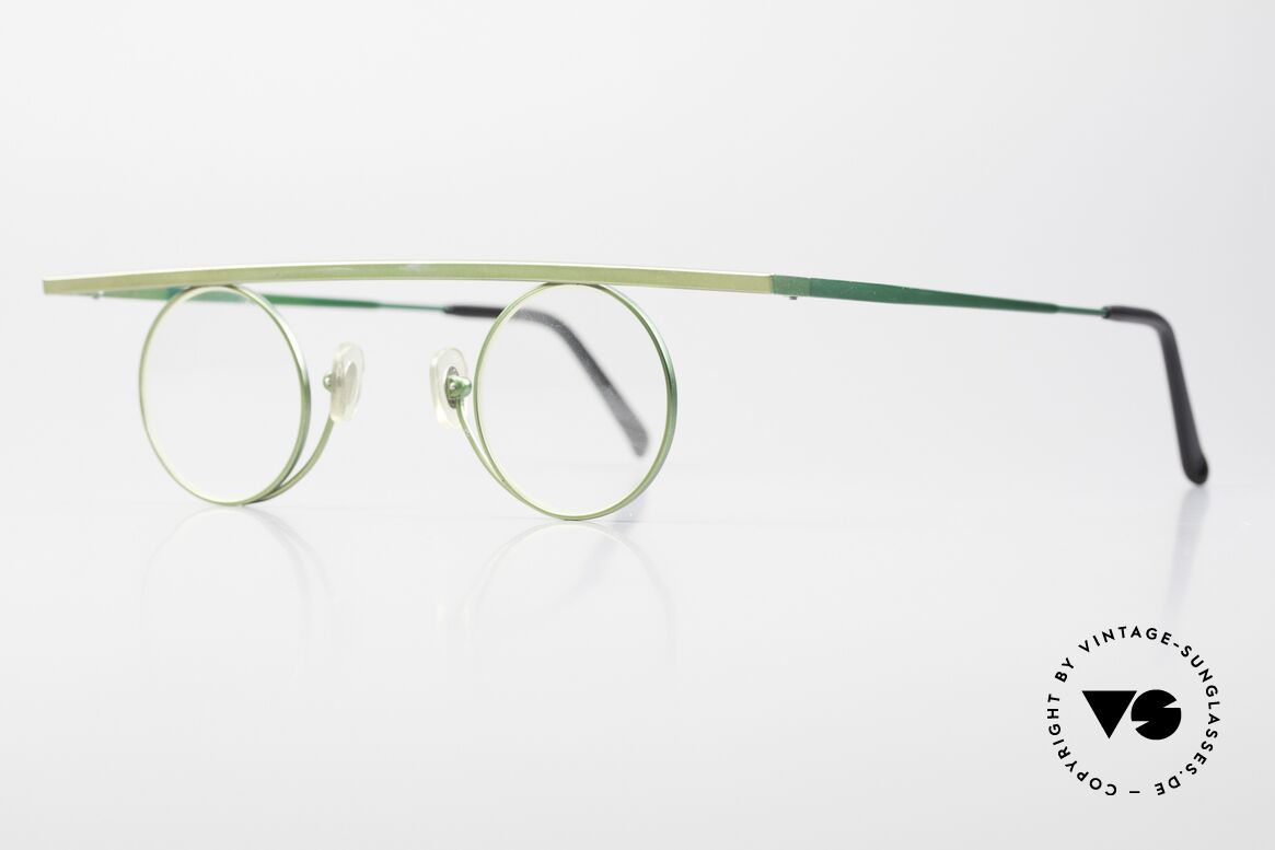 Theo Belgium Tawa Extraordinary 90's Glasses, the frame shines in two different shades of green, Made for Men and Women