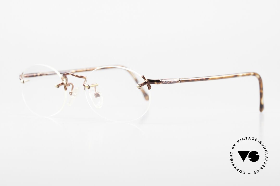 Giorgio Armani 195 Rimless Vintage Frame Oval, rimless frame design with discreet elegant coloring, Made for Men and Women