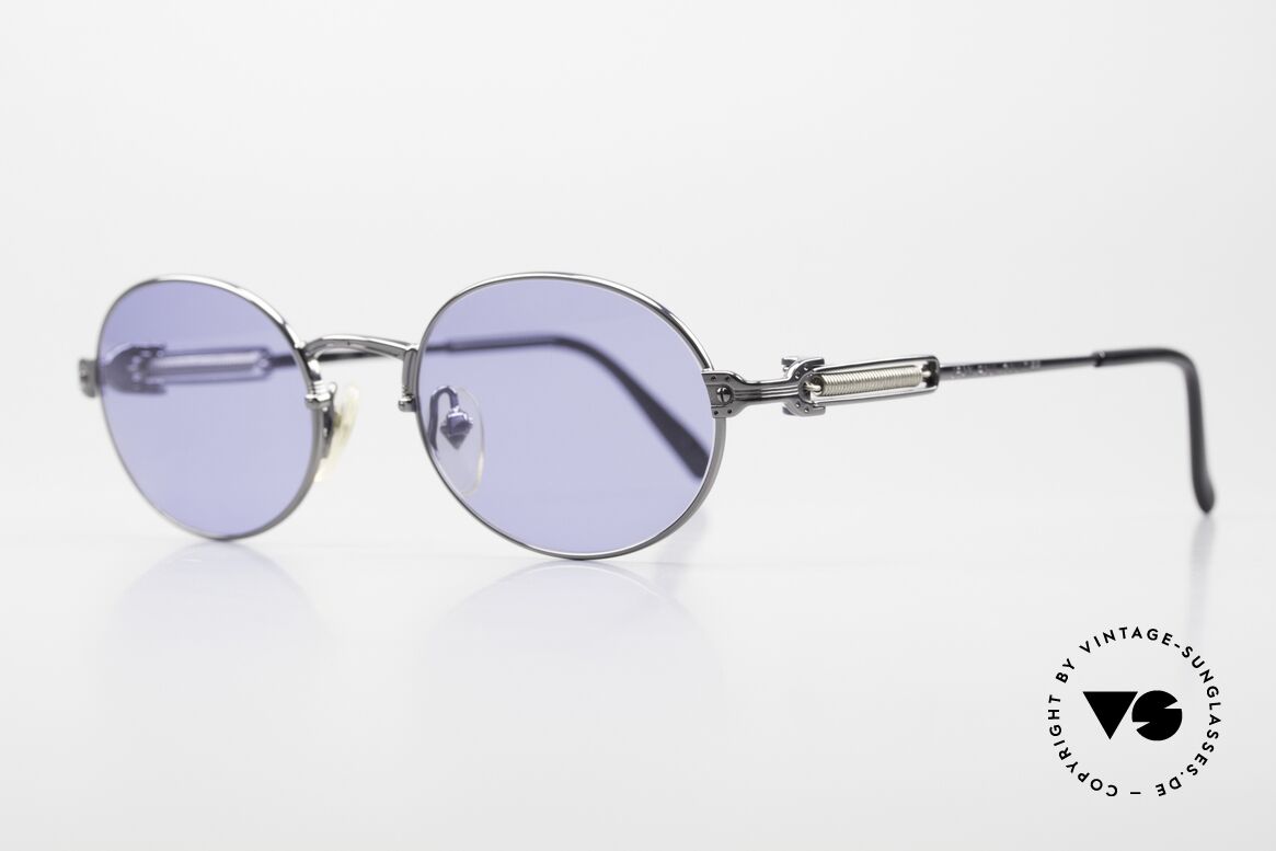 Jean Paul Gaultier 55-5104 Oval Designer Sunglasses, gunmetal frame & blue sun lenses; 100% UV protection, Made for Men and Women
