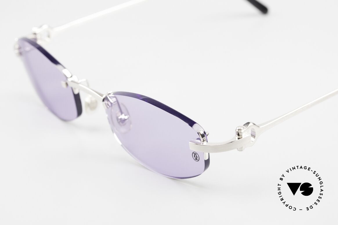 Cartier Meltem Rimless Luxury Sunglasses, smooth platinum finish frame; with orig. case, Made for Men and Women