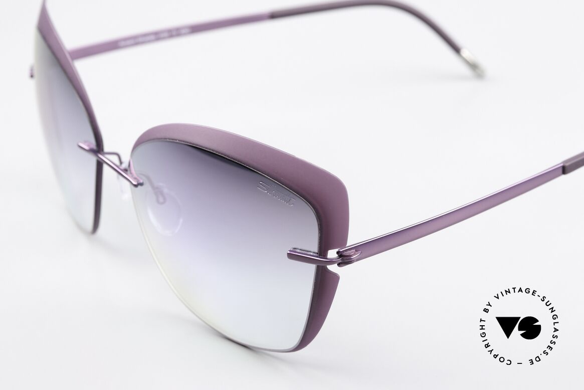Silhouette 8166 With Mirrored Sun Lenses, rimless titanium frame with plastic lens front, Made for Women