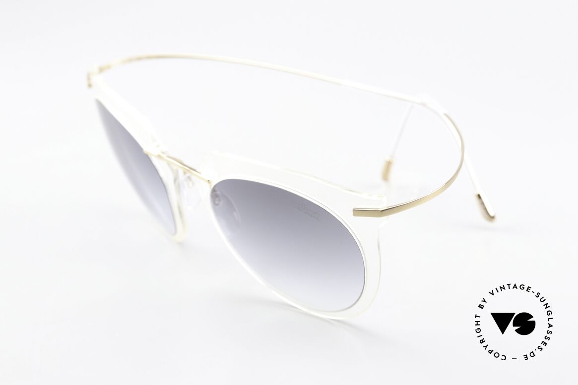 Silhouette 9909 Crystal Clear Sunglasses, therefore only weighs 13 grams; in 'crystal / gold', Made for Women