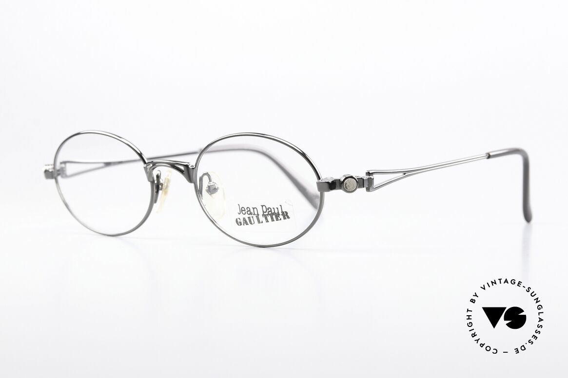 Jean Paul Gaultier 56-7202 Oval Frame Gunmetal Finish, classic oval metal frame with gunmetal finish; 48-19, Made for Men and Women Jean Paul Gaultier 56-7202 Oval Frame Gunmetal Finish, classic oval metal frame with gunmetal finish; 48-19, Made for Men and Women