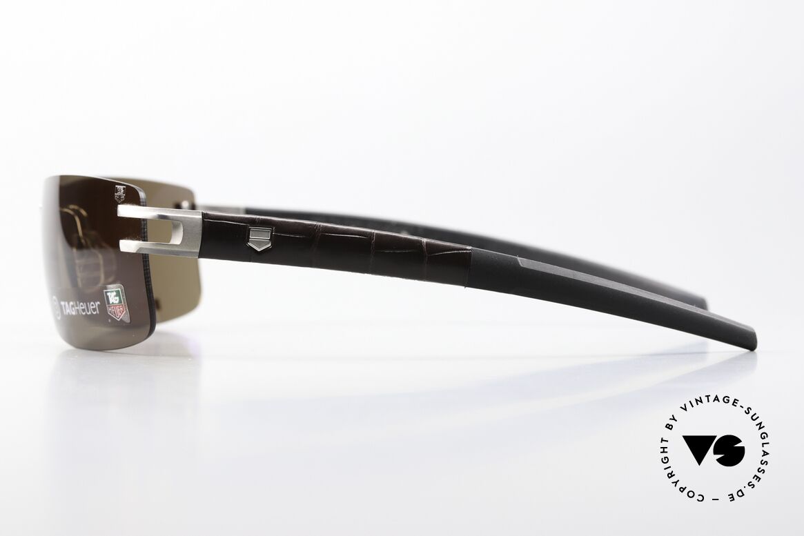 Tag Heuer L-Type 0451 Rimless Luxury Sunglasses, sporty & luxurious 'avant-garde' lifestyle; high-end, Made for Men
