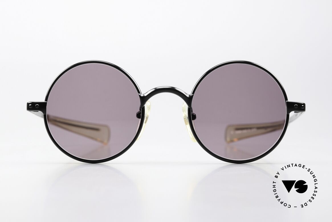 Jean Paul Gaultier 57-0173 High End 90's Sunglasses, model 57-0173 in size 46/22, col. 4: Classic Black, Made for Men and Women