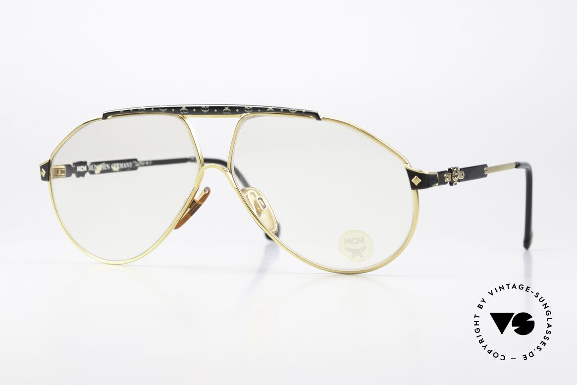 MCM München S2 Lenses Darken Automatically, designer sunglasses by MCM from the early 1990's, Made for Men and Women