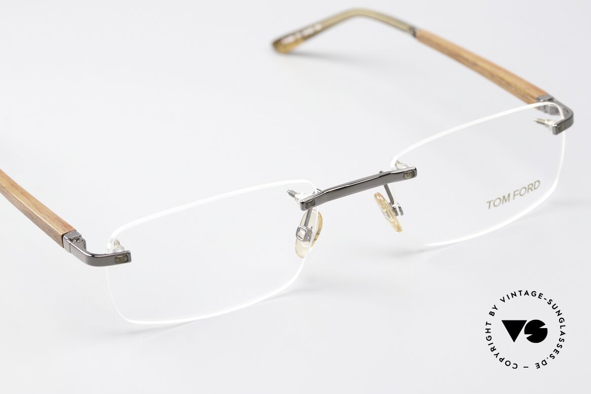 Tom Ford TF5080 Rimeless Wooden Temples, the designer frame can of course be glazed as desired, Made for Men and Women