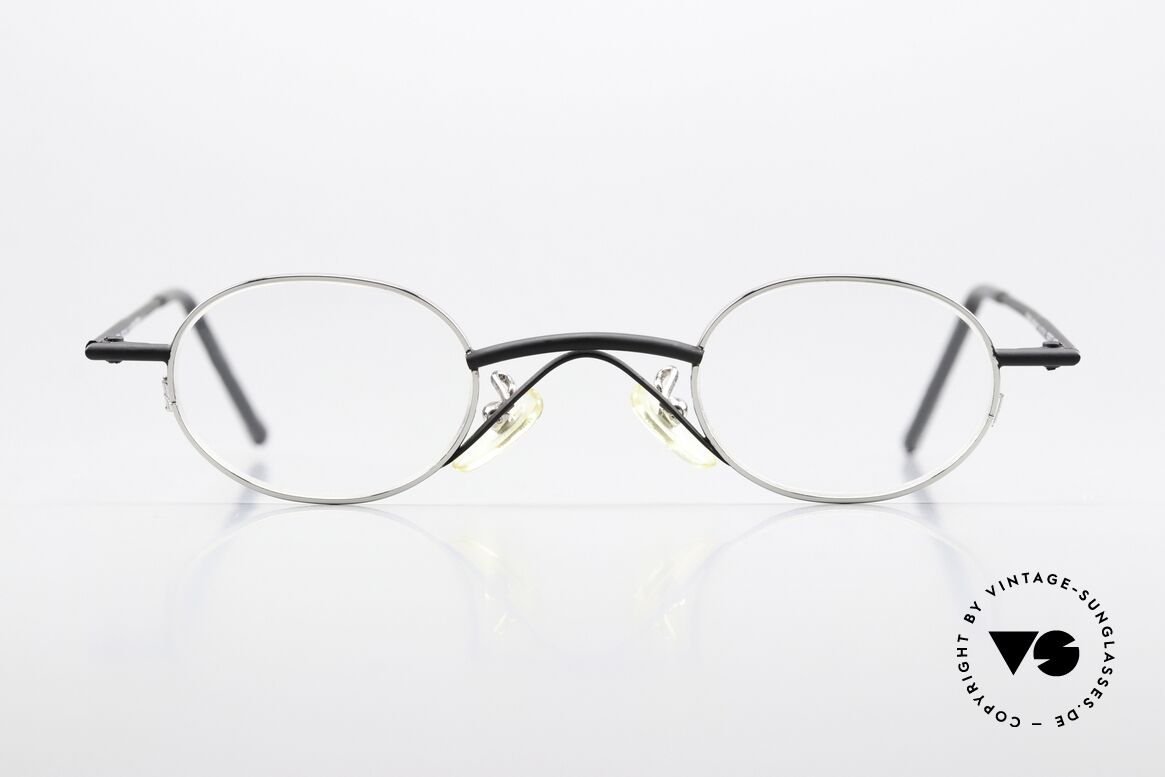 Christian Roth 2400 Small Oval 90's Eyewear, frame finish with "shiny silver" & "matte black", Made for Men and Women