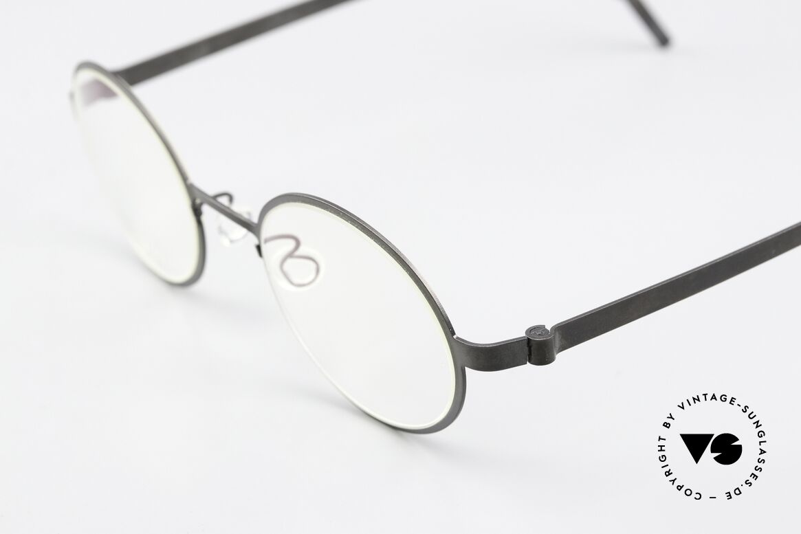 Lindberg 9587 Strip Titanium Black Designer Eyeglasses, bears the predicate "true VINTAGE LINDBERG" for us, Made for Men and Women
